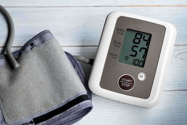 Blood pressure monitor with a reading of 84/57 mmHg
