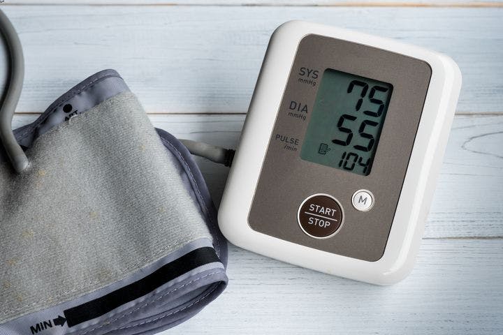  A blood pressure monitor with a reading of 75/55