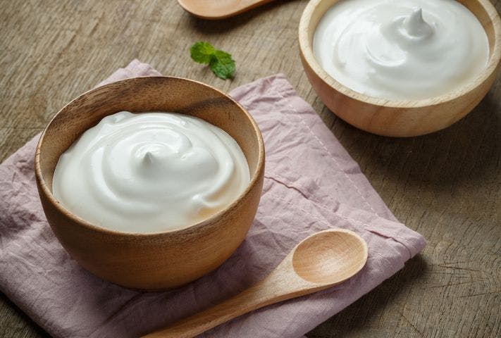 Bowls of yoghurt on a table