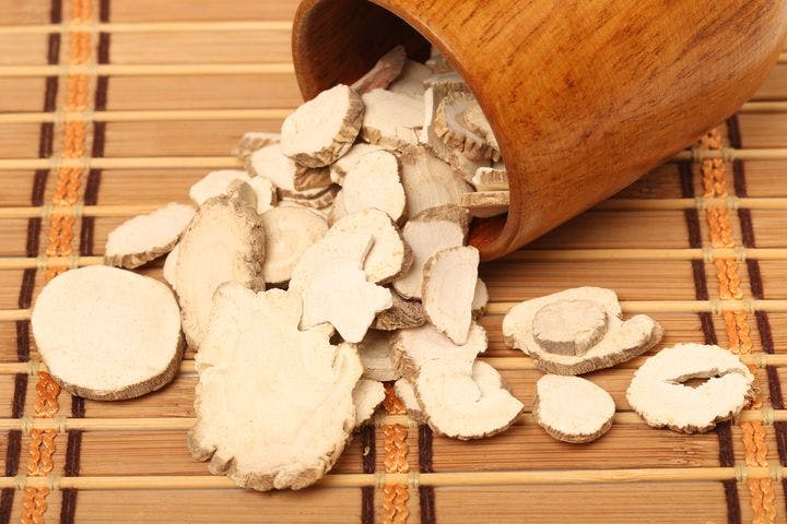 Slices of Angelica root, a Chinese herb for healthy scalp