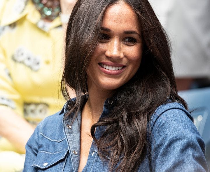 Close-up of Meghan Markle, the Duchess of Sussex, smiling.