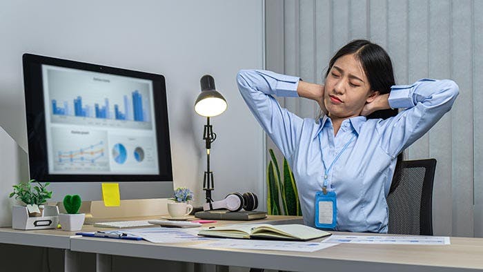 Asian woman office worker close eyes