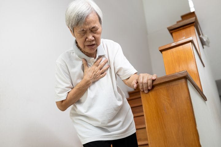 Elderly Asian man with breathlessness.