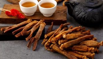 Slices of dried red ginseng to treat erectile dysfunction laid on a table