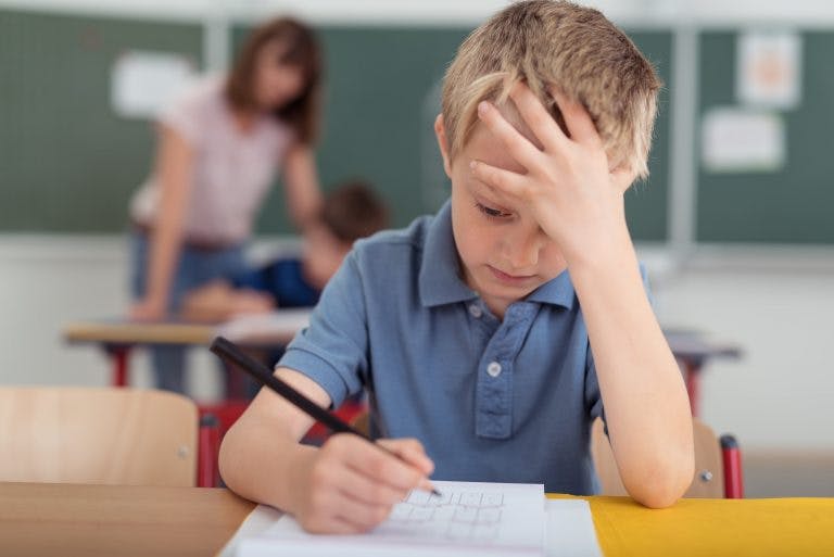 Young child stressed at school min scaled