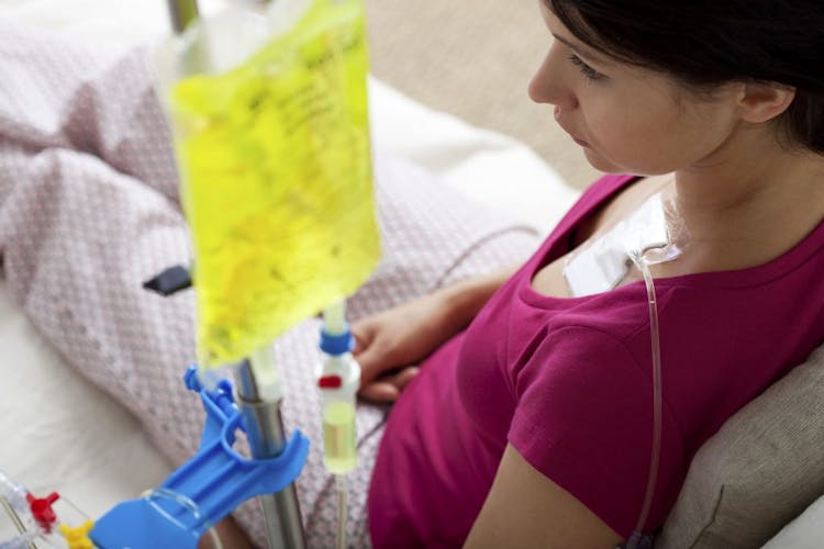 A female cancer patient undergoing IV treatment 